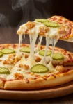 served slice of chicken pickle pizza