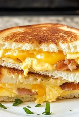 Bacon and Egg Grilled Cheese Sandwiches